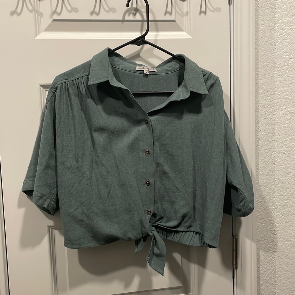Green cropped blouse.
